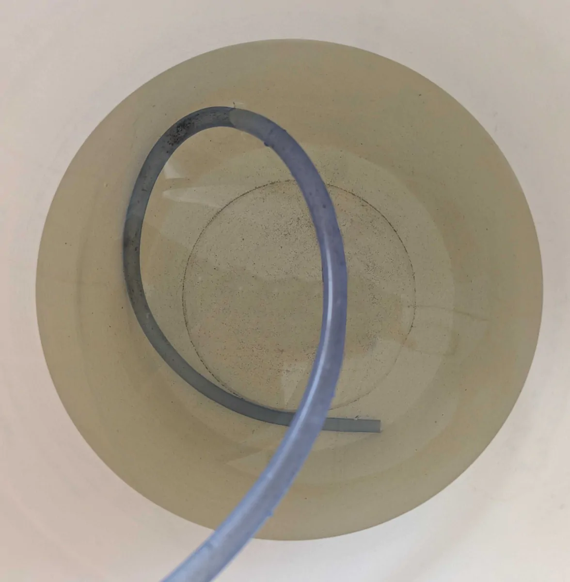 Yellow_water_in_bucket_copy_Vertical